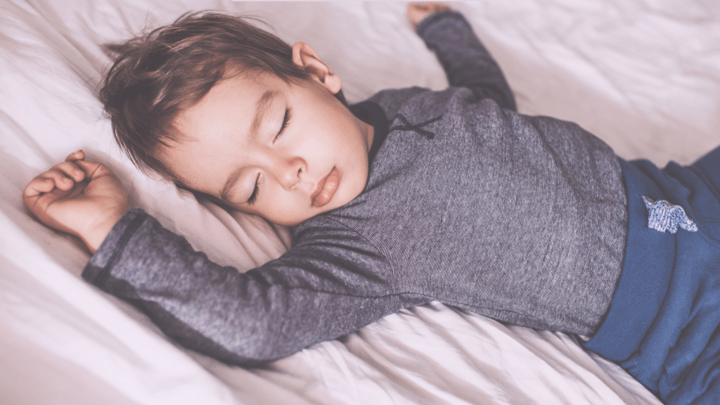 toddler peacefully sleeping representing benefits of toddler & early childhood sleep training