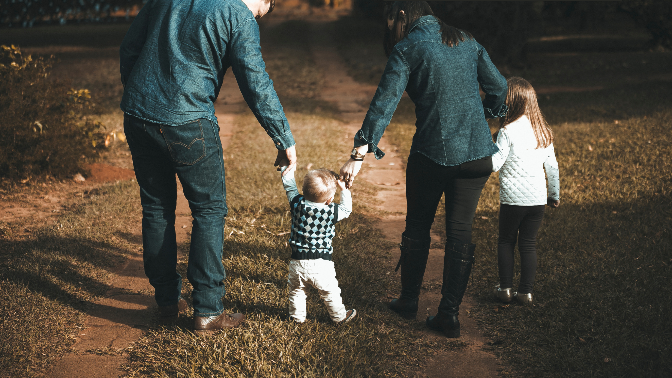 Family in Fall representing the fall back time change